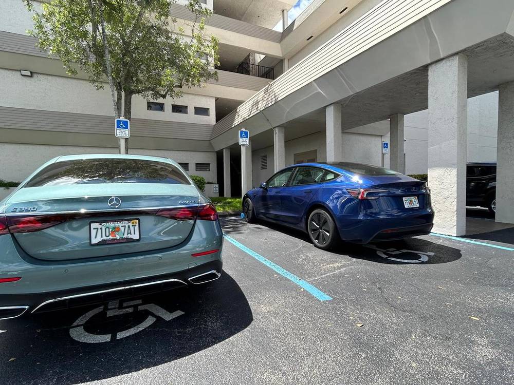Back parking lot entrance with handicap accessible parking